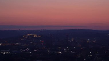 Brno, Czech Republic - March 29, 2025: View of the city from above at night. Evening city panorama. Shpilberk Castle.
