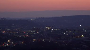 Brno, Czech Republic - March 29, 2025: View of the city from above at night. Evening city panorama. Shpilberk Castle.