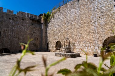 KRK Island, Croatia - April 19, 2025: Cityscape. View of Frankopan Castle.