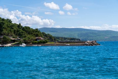 KRK Island, Croatia - April 19, 2025: Cityscape. View of urban real estate. Yachts moored in the marina