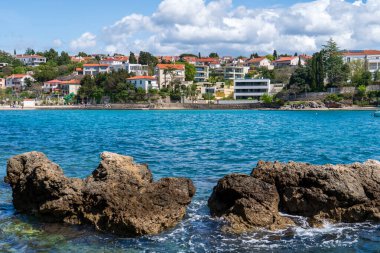 KRK Island, Croatia - April 19, 2025: Cityscape. View of urban real estate. Villa by the sea.