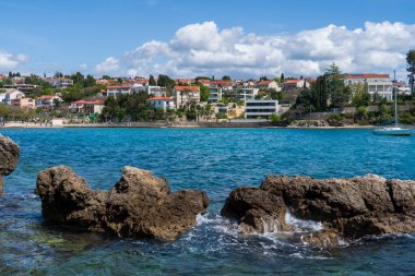 KRK Island, Croatia - April 19, 2025: Cityscape. View of urban real estate. Villa by the sea.