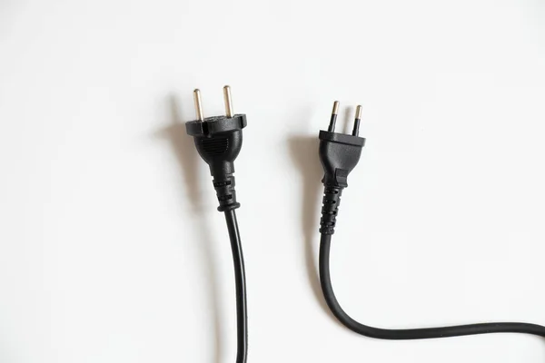 Twee Zwarte Kabels Met Stekkers Een Witte Achtergrond Kabel Stroom — Stockfoto