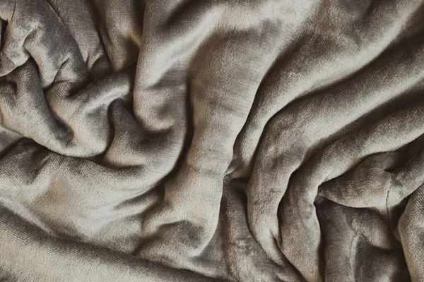 stock image Gray soft wrinkled fabric as a background, a gray dressing gown as a close-up background