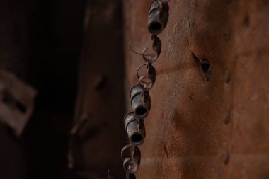 Exploded bullets in a cartridge belt inside an exploded Russian tank in Ukraine, a Russian tank and weapons