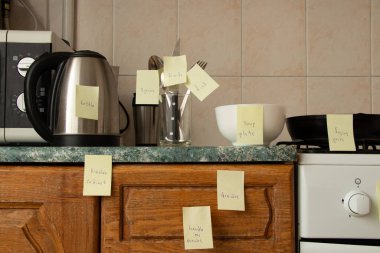 Learning English using cards hung in the kitchen in the apartment, learning a foreign language