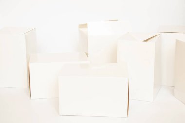 A lot of white empty boxes on a white background, boxes