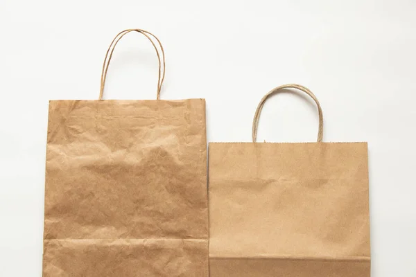 stock image Brown paper packaging bag isolated on white background