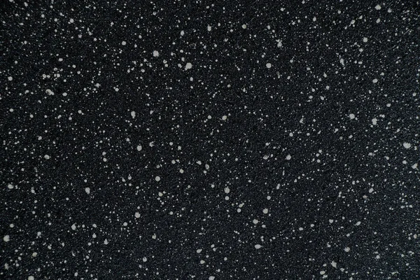 白い小さな点で非スティックフライパンの黒の背景 — ストック写真