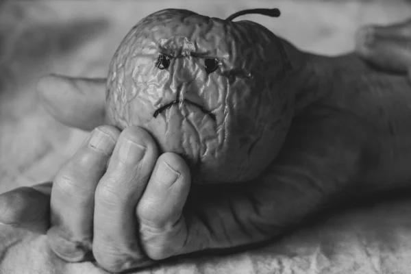 One Dry Sluggish Apple Sad Smile Hands Old Woman Hunger — Stock Photo, Image