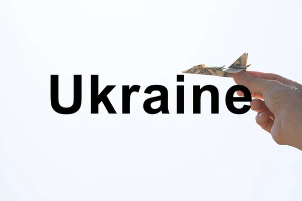 Avião Dólar Mão Uma Menina Céu Sobre Ucrânia Texto Ucrânia — Fotografia de Stock