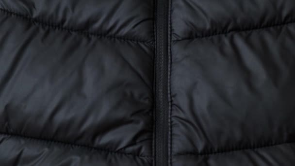 Black Puffy Winter Jacket Zipper Background Close Black Background Royalty Free Stock Footage
