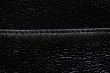 Siyah tahıl hakiki deri ve arka plan olarak cep, deri erkek çantası.