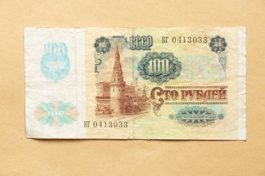 Vintage SSCB banknotu 100 ruble 1991 Lenin 'in portresi ve bir el sanatları geçmişinde arma, eski para
