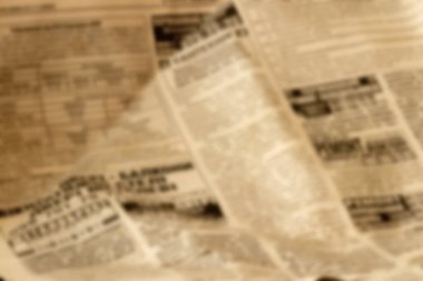 Eskimiş eski gazete tonları retro tasarım ya da klasik düzenler için arka plan olarak bulanıklaştırılmış