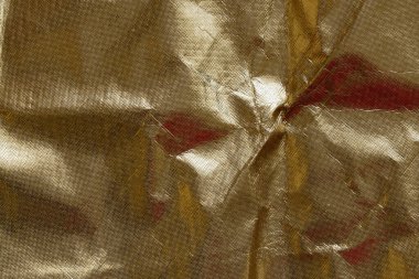 Yağ bezi desenli altın yaldızlı arkaplan, arkaplan ve şablonlar için parlatıcı ve katlı soyut materyal, altın arkaplan