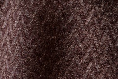Kahverengi yün kazak, yün örgü kumaş, moda ve tasarım için arka plan kumaşı.