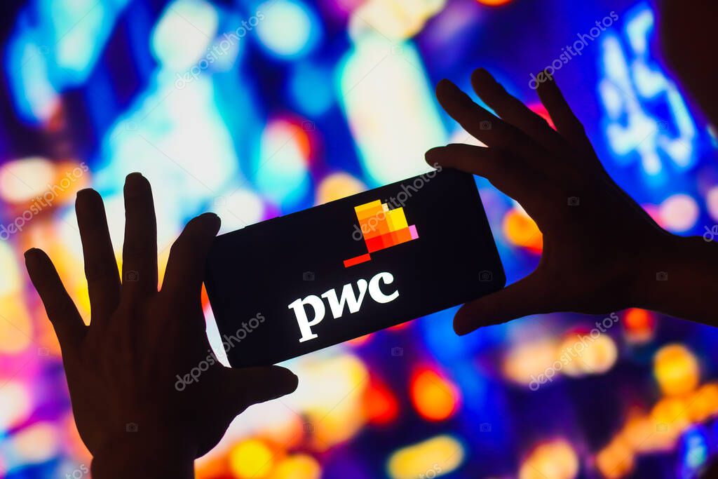 November 23, 2022, Brazil. In this photo illustration, the PwC logo is displayed on a smartphone screen
