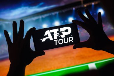 January 9, 2023, Brazil. In this photo illustration, the ATP Tour (ATP World Tour) logo is displayed on a smartphone screen clipart