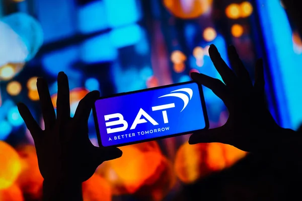 stock image January 11, 2023, Brazil. In this photo illustration, the British American Tobacco (BAT) logo is displayed on a smartphone screen