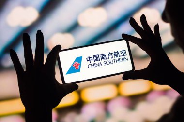 February 4, 2023, Brazil. In this photo illustration, the China Southern Airlines logo is displayed on a smartphone screen