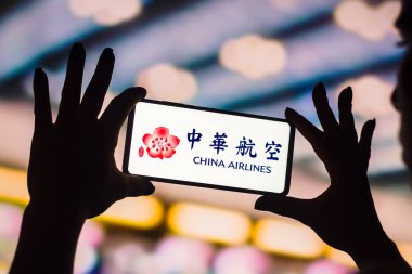 February 4, 2023, Brazil. In this photo illustration, the China Airlines logo is displayed on a smartphone screen