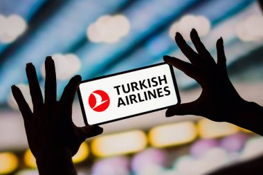 February 6, 2023, Brazil. In this photo illustration, the Turkish Airlines logo is displayed on a smartphone screen