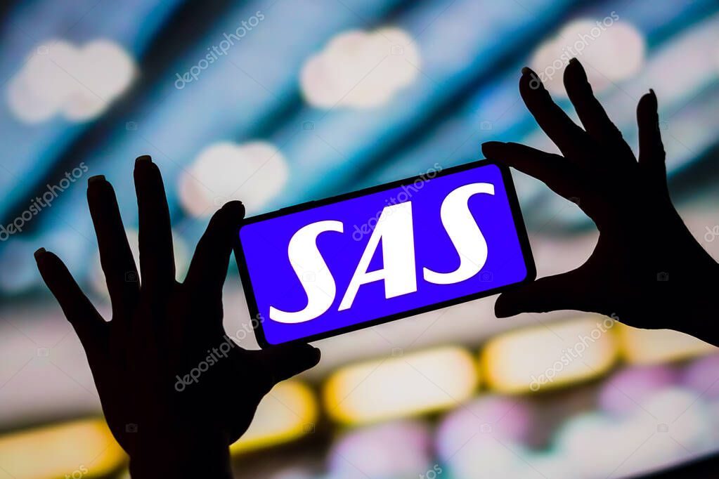 February 6, 2023, Brazil. In this photo illustration, the Scandinavian Airlines System (SAS) logo is displayed on a smartphone screen