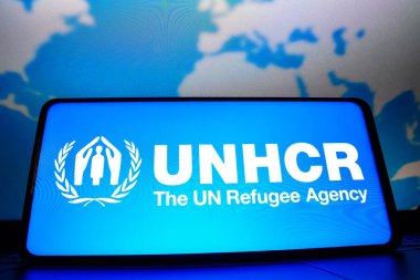 23 Mart 2023, Brezilya. Bu resimde, Birleşmiş Milletler Mülteciler Yüksek Komiserliği (UNHCR) logosu akıllı telefon ekranında görüntülendi