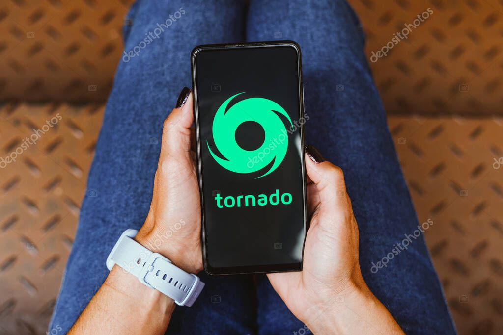 May 22, 2023, Brazil. In this photo illustration, the Tornado Cash logo is displayed on a smartphone screen