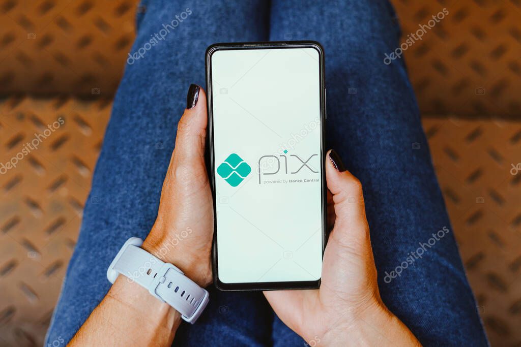 May 22, 2023, Brazil. In this photo illustration, the Pix powered by Banco Central logo is displayed on a smartphone screen
