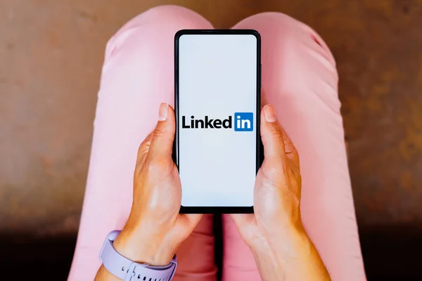 Stock image May 25, 2023, Brazil. In this photo illustration, the LinkedIn logo is displayed on a smartphone screen