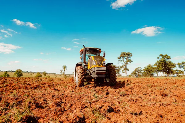 stock image June 2, 2023, Brazil. A Valtra tractor plows soil for use in agriculture on a rural property in Brazil