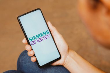 June 5, 2023, Brazil. In this photo illustration, the Siemens Energy AG logo is displayed on a smartphone screen clipart