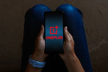 June 12, 2023, Brazil. In this photo illustration, the OnePlus logo is displayed on a smartphone screen clipart