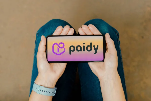 stock image June 30, 2023, Brazil. In this photo illustration, the Paidy logo is displayed on a smartphone screen
