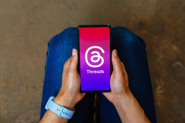 July 6, 2023, Brazil. In this photo illustration, the app Threads from Meta seen displayed on a mobile phone. Threads is the latest app launched by Meta. The Threads app is the direct rival of Twitter