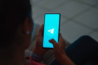 July 7, 2023, Brazil. In this photo illustration, the Telegram logo is displayed on a smartphone screen clipart