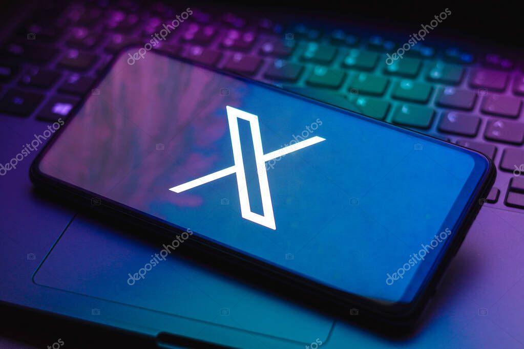 July 24, 2023, Brazil. In this photo illustration, the Twitter (X) new logo seen displayed on a smartphone