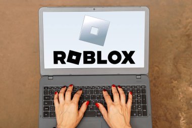 September 30, 2023, Brazil. In this photo illustration, the Roblox logo is displayed on a laptop screen clipart