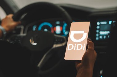 October 2, 2023, Brazil. In this photo illustration, the Didi Chuxing logo is displayed on a smartphone screen clipart
