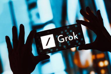 November 6, 2023, Brazil. In this photo illustration, the Grok logo is displayed on a smartphone screen. Grok is an artificial intelligence chatbot associated with the social network X, created by Elon Musk clipart