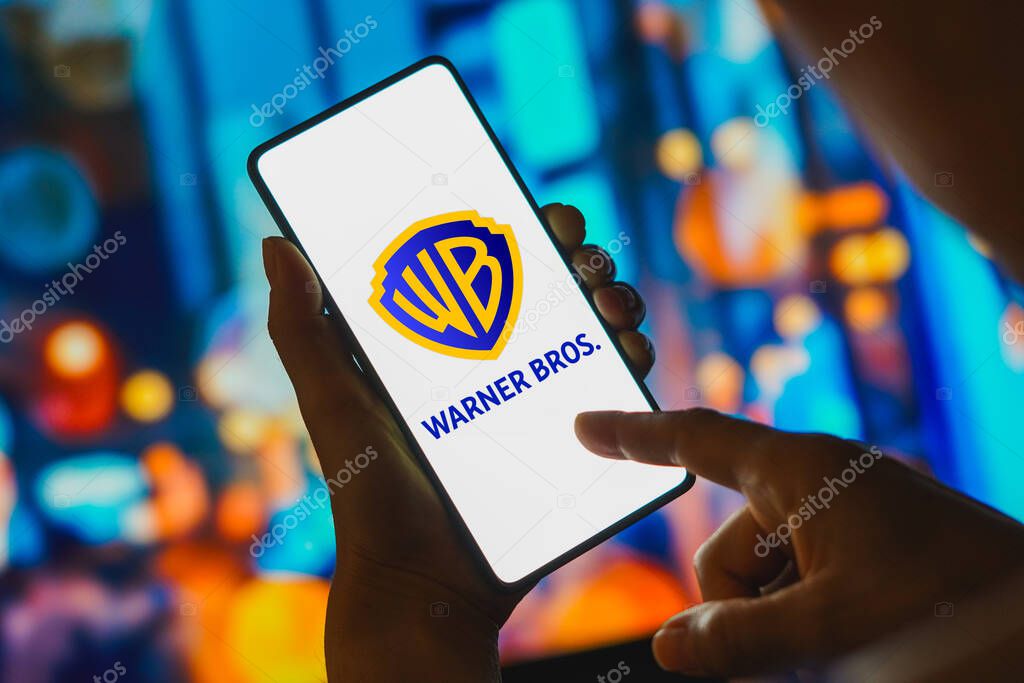 December 9, 2023, Brazil. In this photo illustration, the Warner Bros. Entertainment logo is displayed on a smartphone screen