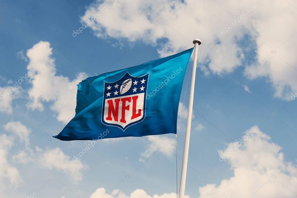 December 15, 2023, Brazil. In this photo illustration the National Football League (NFL) soon appears on a flag