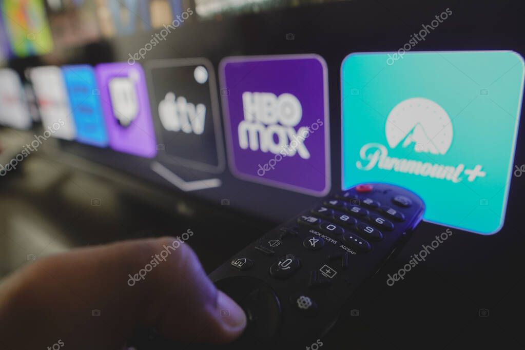 January 8, 2024, Brazil. In this photo illustration the Paramount Plus, HBO Max and Apple TV logo is displayed on a TV screen