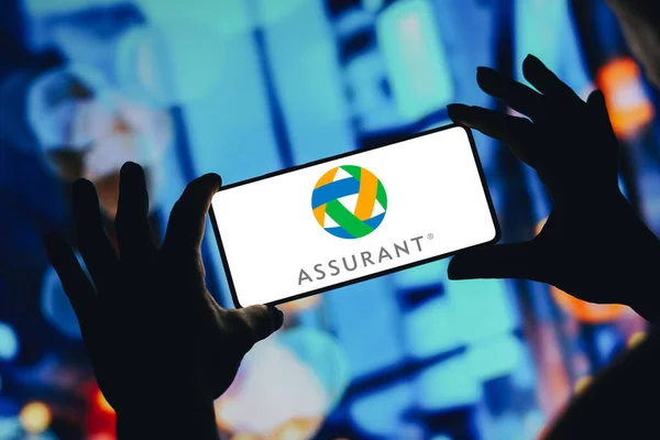 stock image January 15, 2024, Brazil. In this photo illustration, the Assurant, Inc. logo is displayed on a smartphone screen