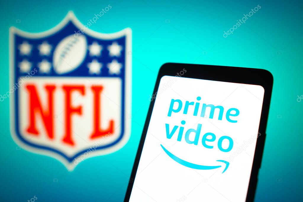 January 23, 2024, Brazil. In this photo illustration, the Amazon Prime Video logo is displayed on a smartphone screen and National Football League (NFL) logo in the background