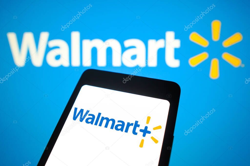 February 21, 2024, Brazil. In this photo illustration, the Walmart Plus logo is displayed on a smartphone screen and in the background, Walmart logo