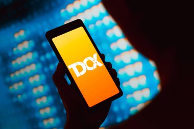 4 Mart 2024, Brezilya. Bu resimde, TDCX logosu akıllı telefon ekranında görüntülenir