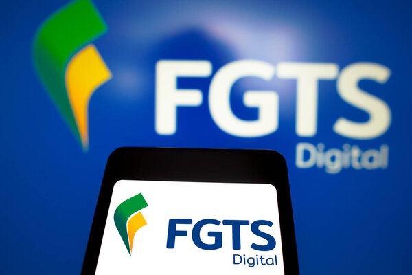 March 4, 2024, Brazil. In this photo illustration, the FGTS Digital logo is displayed on a smartphone screen and in the background